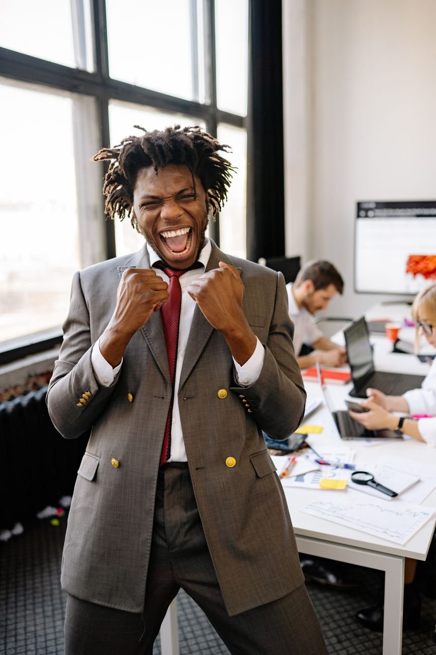 Excited businessman celebrating success